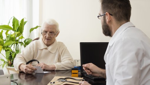 Photo of a doctor talking to a patient