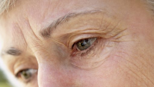 Photo of an older woman deep in thought