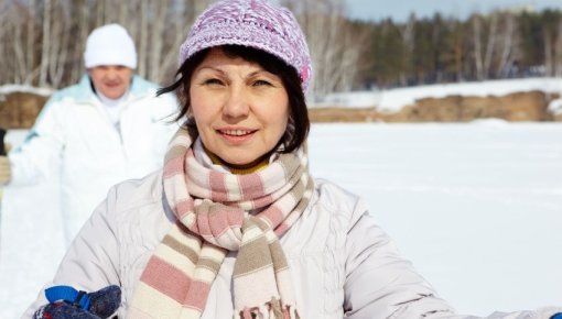 Photo of a woman cross-country skiing