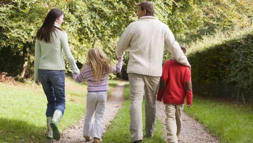 photo of family taking a stroll