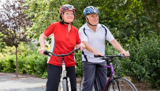 Photo of a couple riding bikes