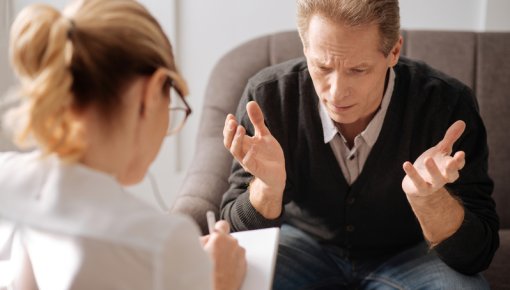 Photo of man at a therapy session