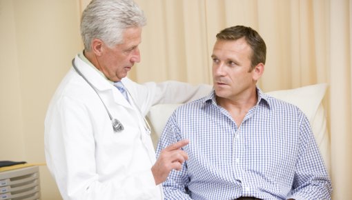 Photo of a doctor talking to a patient