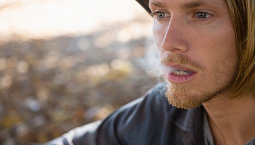 Photo of a young man smoking