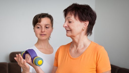 Photo of a physiotherapist and patient