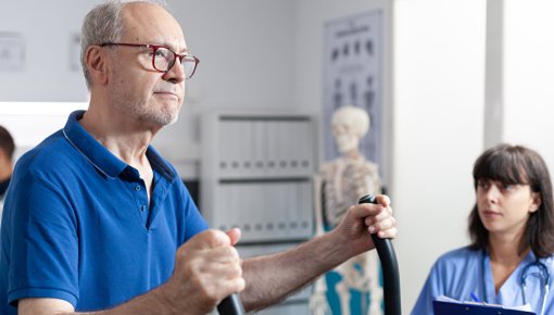 Photo of a patient and physical therapist