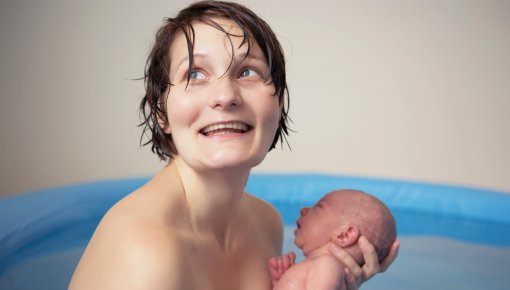 Photo of a mother with newborn baby
