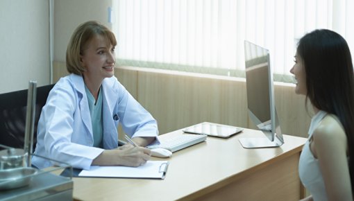 Photo of doctor and female patient