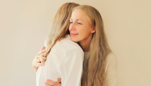 Photo of two women hugging
