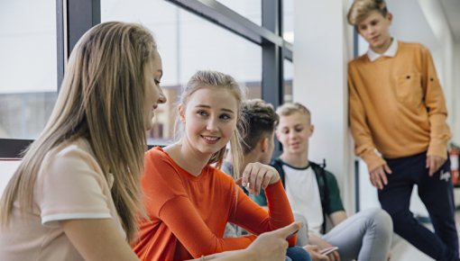 Teenagers chatting during recess