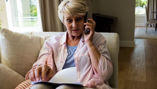 Photo of a woman on the phone