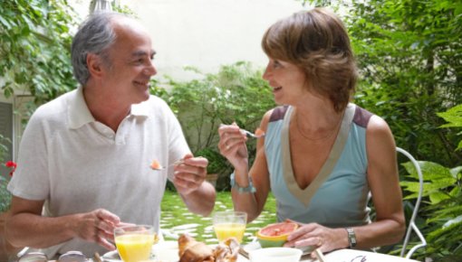 Photo of a couple having breakfast