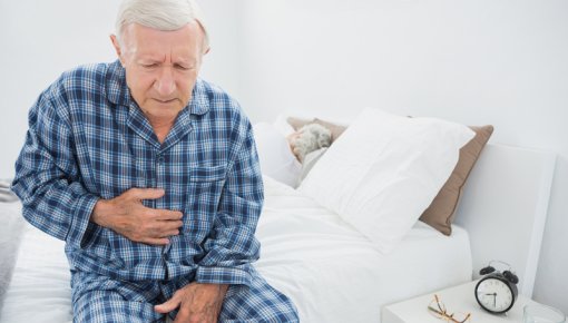 Photo of a man with heartburn