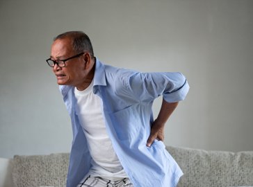 Photo of a man with back pain