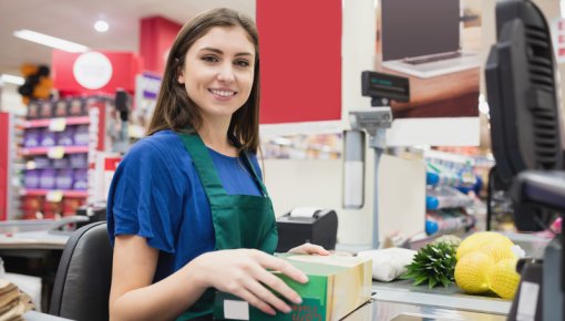 Photo of a woman at a cash register