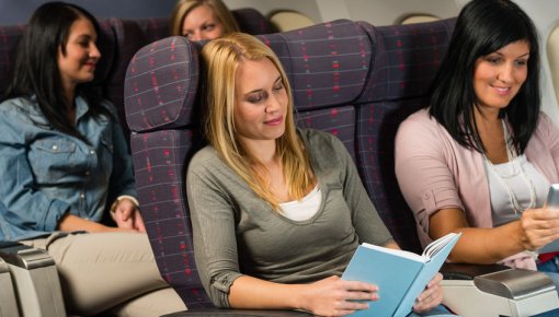 Photo of women on an airplane