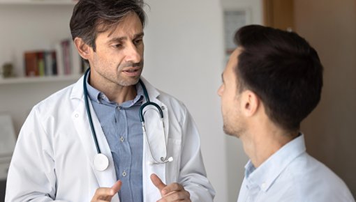 Photo of a doctor and patient talking