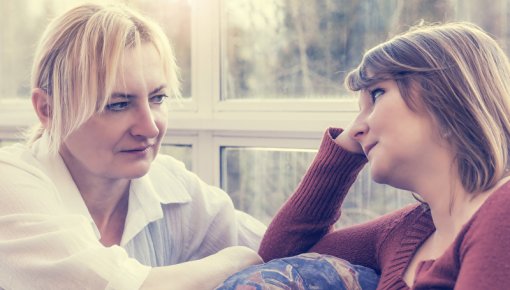 Photo of two women talking