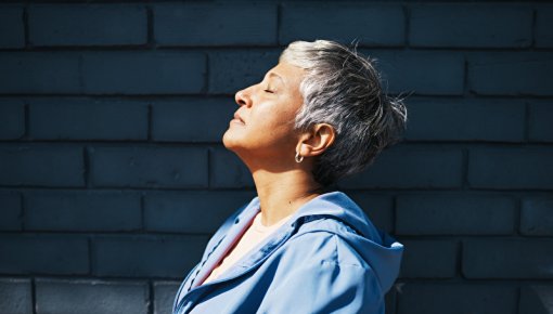 Photo of a woman enjoying the sun