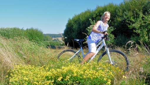 Photo of a woman cycling