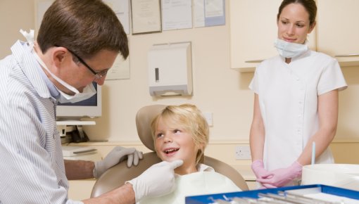 Photo of a young boy at a visit to the dentist