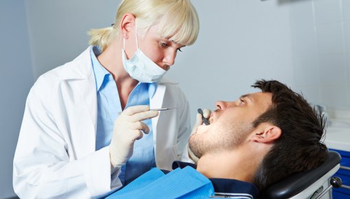 Photo of a man at the dentist