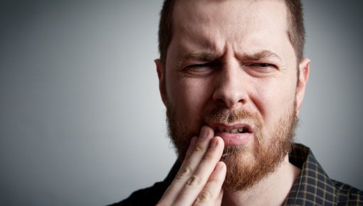 Photo of a man with toothache